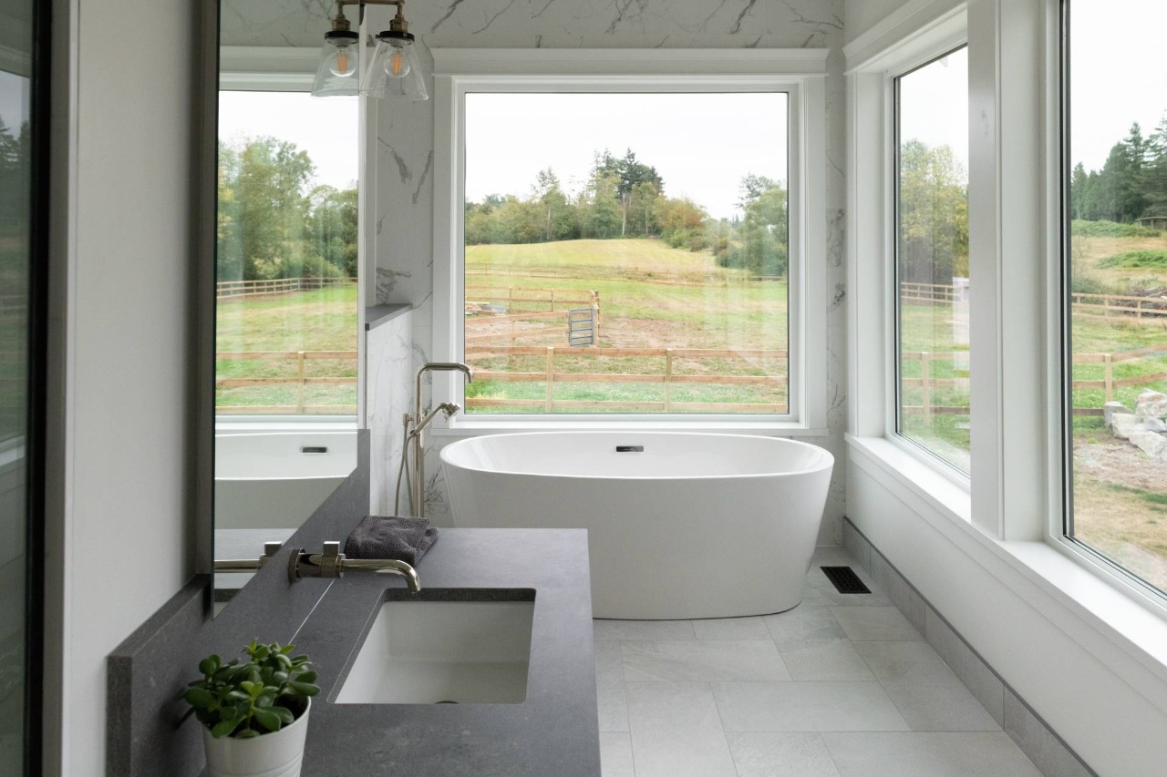 An updated bathroom with large windows in a home at Window Creations & Design Center near Fort Gratiot, (MI)